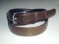 Brown karung snakeskin mans belt silver color buckle.