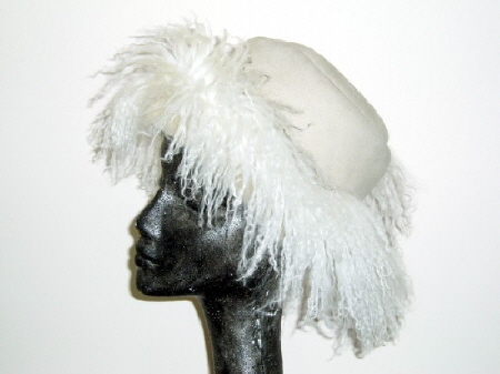Great sheepskin  hats for apres ski or a winter wedding. �45