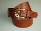 Cognac crocodile print leather belt.
