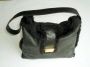Black sheepskin bag with gold color bar trim �35