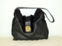 Black sheepskin bag with lion trim �35